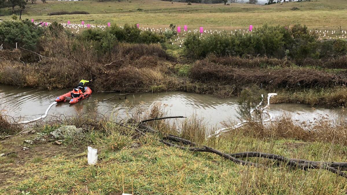 A major spill control operation was launched after more than 2500 litres of solvent entered the Molonglo River in May 2020. Picture: NSW EPA