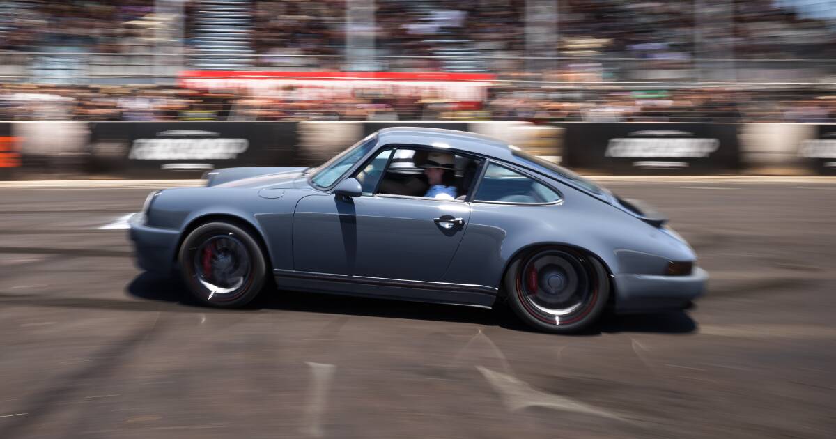 The million dollar Porsche roared down the track in front of the Summernats crowd. Picture by Sitthixay Ditthavong