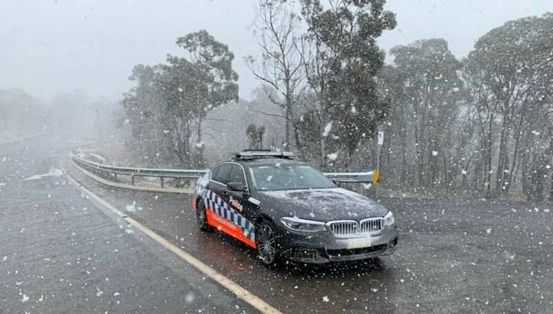 A NSW police Highway Patrol car screening vehicles entering the snowfields. Picture: NSW Police 