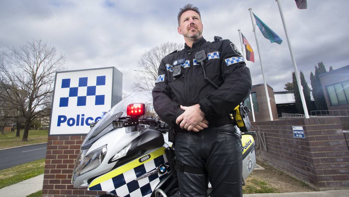 Senior Constable Aaron Cherry with his unique police motorcycle. Picture: Keegan Carroll