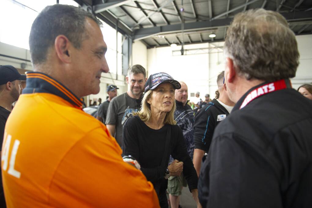 US ambassador Caroline Kennedy talks cars with chief judge Owen Webb and event co-owner Andy Lopez after touring the pavilion. Picture by Keegan Carroll