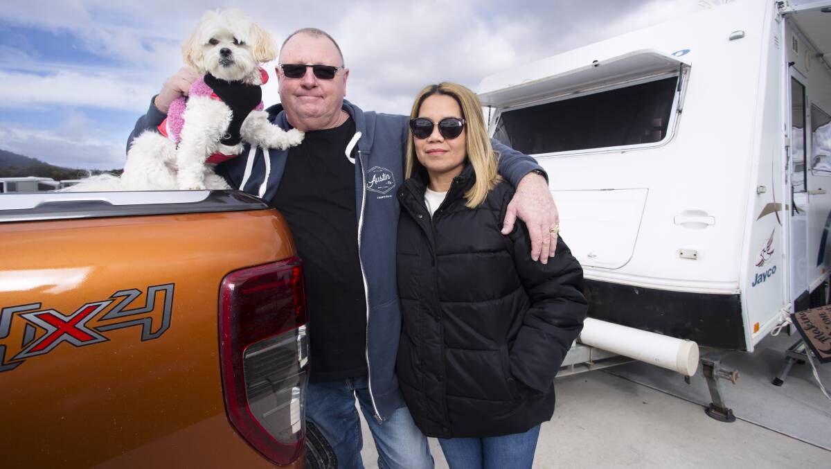 Craig and Emie Sullivan travelled from South Australia with their dog, Bella, towing a modest-sized van. Picture: Keegan Carroll