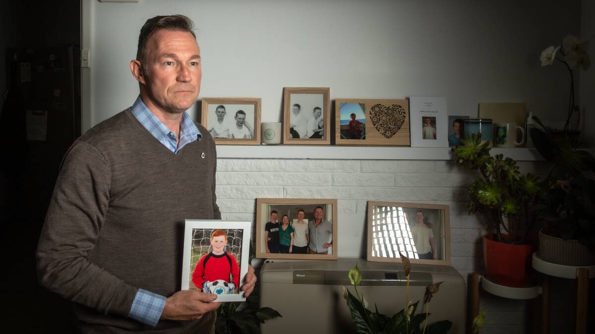 Tom McLuckie at the portrait wall in his home which honours his son, Matthew, who was the blameless victim of reckless drivers on May 19. Oicture: Karleen Minney