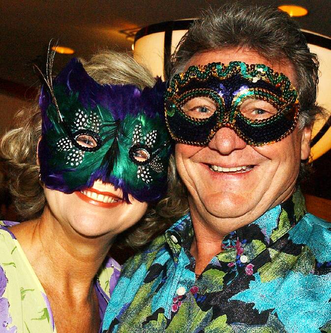 Chic and Debra Henry at the 2004 New Year's Eve masked ball at the Canberra Hyatt. Picture: Martin Jones 