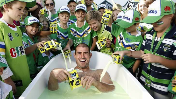The famous relaunch of the lime Canberra Milk, with Raiders captain Terry Campese bathing in it. Picture by Jeffery Chan