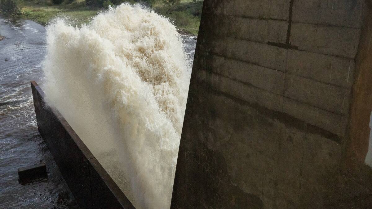Canberra's recent heavy rainfall has triggered the opening of the Scrivener Dam sluicegates. Picture: Elesa Kurtz