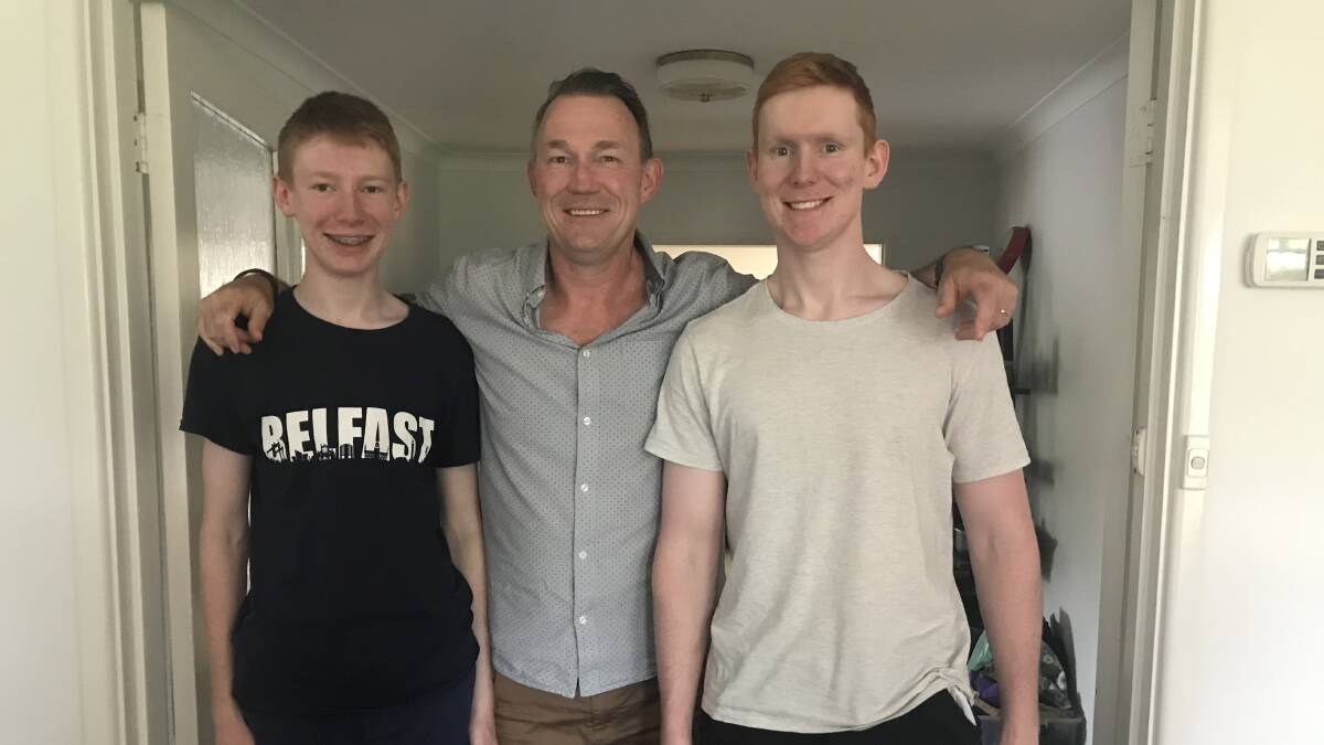 Matthew McLuckie, right, with his father, Tom, and brother, Joseph. Picture: Supplied