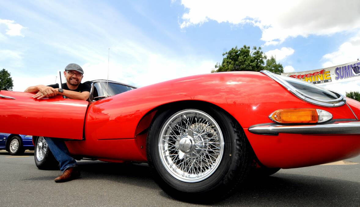 Former Australian touring car champion John Bowe and his E-Type Jaguar. Picture Kate Leith 