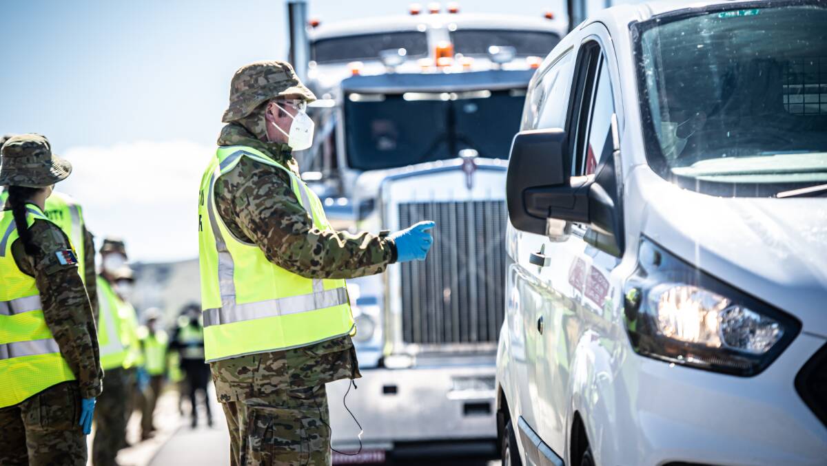 Canberra-based Defence Force personnel led by Colonel John Brennan and ACT Road Policing members led by Detective acting Superintendent Donna Hofmeier were deployed at the border for the first time together on Wednesday. Pictures: Karleen Minney