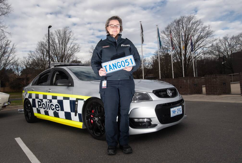 ACT Traffic Operations Superintendent Corey Heldon, who began the official paperwork three years ago to keep the last V8 Commodore for the police museum. Picture: Karleen Minney 