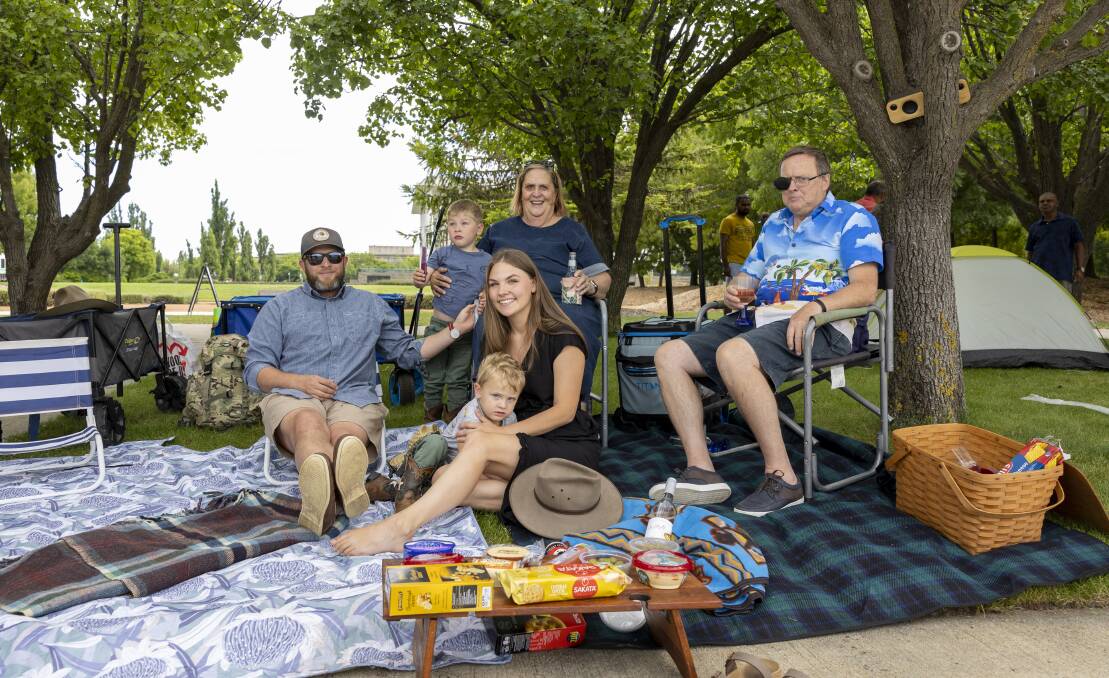The Tarpley family - (from left) James, Peter (3), Emily, Tom (2) and grandparents Michaela and Andrew - travelled down from Yass to be by the lake for the 9pm fireworks show. Picture by Keegan Carroll 