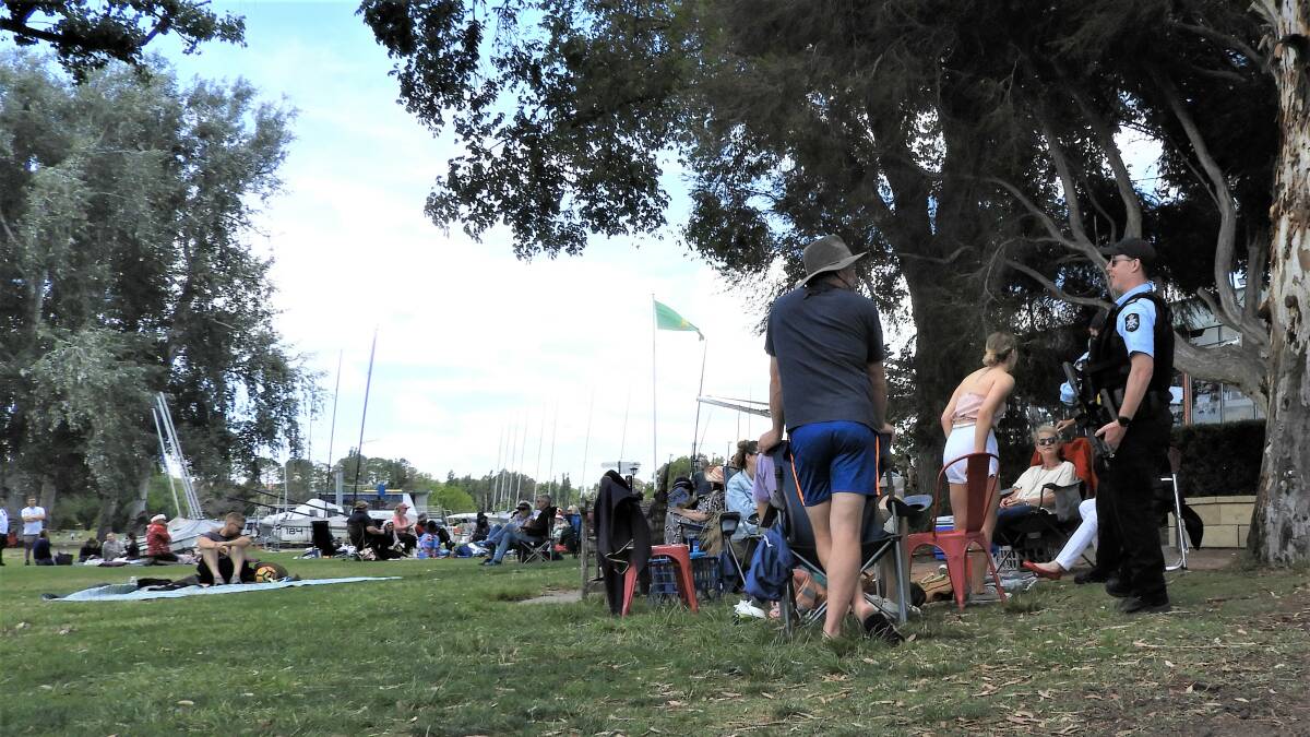 As Canberra's festive-makers gathered at the Canberra Yacht Club, AFP protection officers chose to bring their automatic weapons. Picture: Supplied