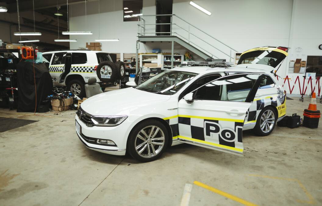 Inside the police technical workshop, with a VW Passat turbo wagon in for a fit-out. Picture: Dion Georgopoulos 