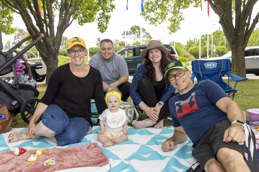 Nicole Carey, Ross Ashcroft, Clare Carey and Andrew Devereux with seven-month-old Zoe took up a spot under the trees along Queen Elizabeth Terrace. Picture by Keegan Carroll 