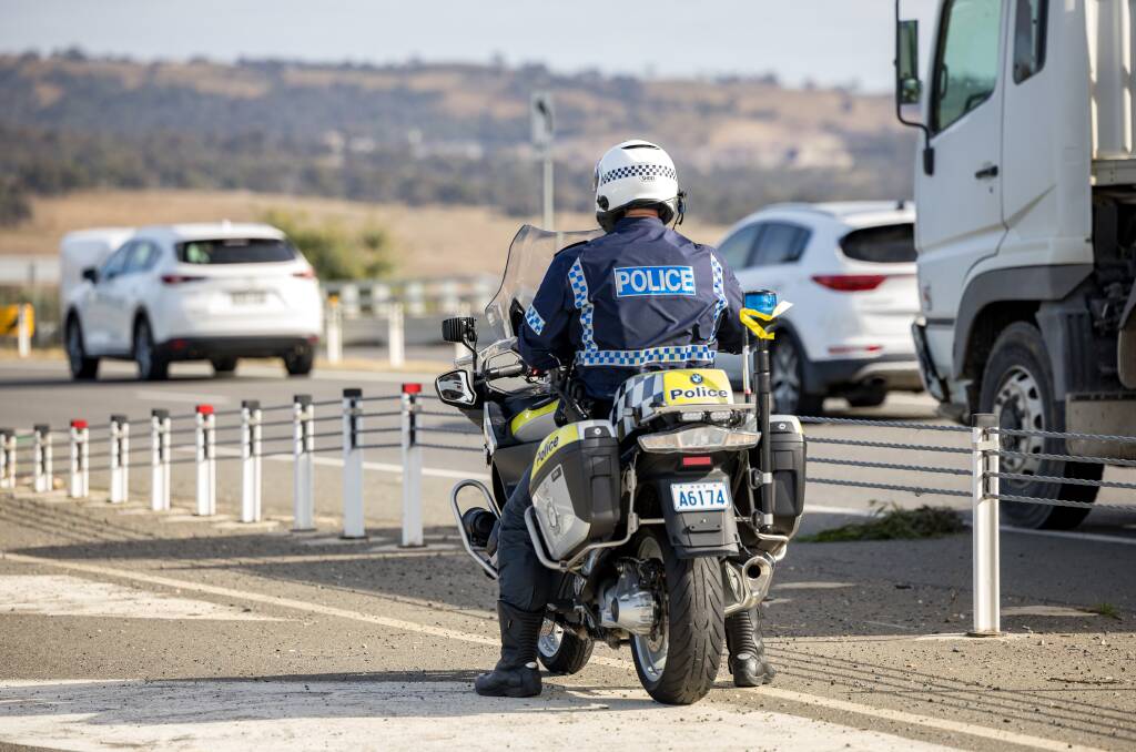 A police motorcycle using ANPR to scan traffic on Lanyon Drive. Picture by Sitthixay Ditthavong 