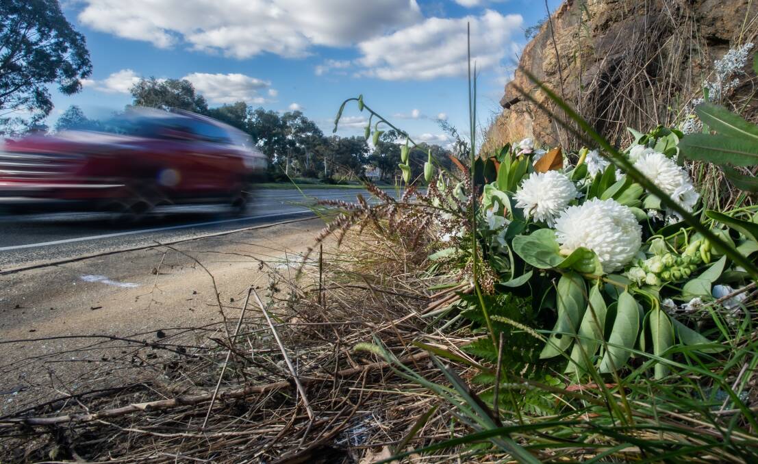 Flowers at the crash site on Hindmarsh Drive where 20-year-old Matthew McLuckie was killed. Picture: Karleen Minney