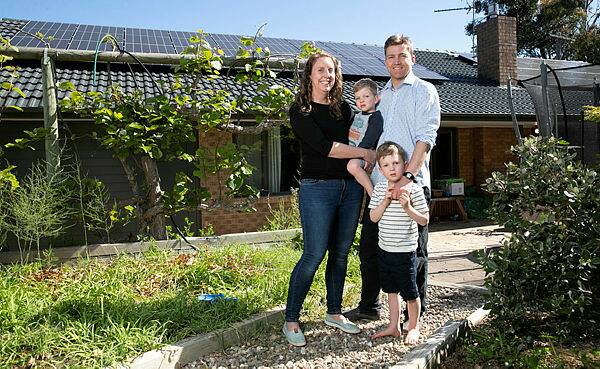 Deb and Darren Robinson, with sons Joshua and Lucas, and their 11.1kW solar array financed through the scheme. Picture: Keegan Carroll