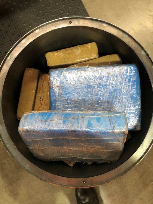 Blocks of concealed cocaine inside a pressure cooker. Picture: AFP