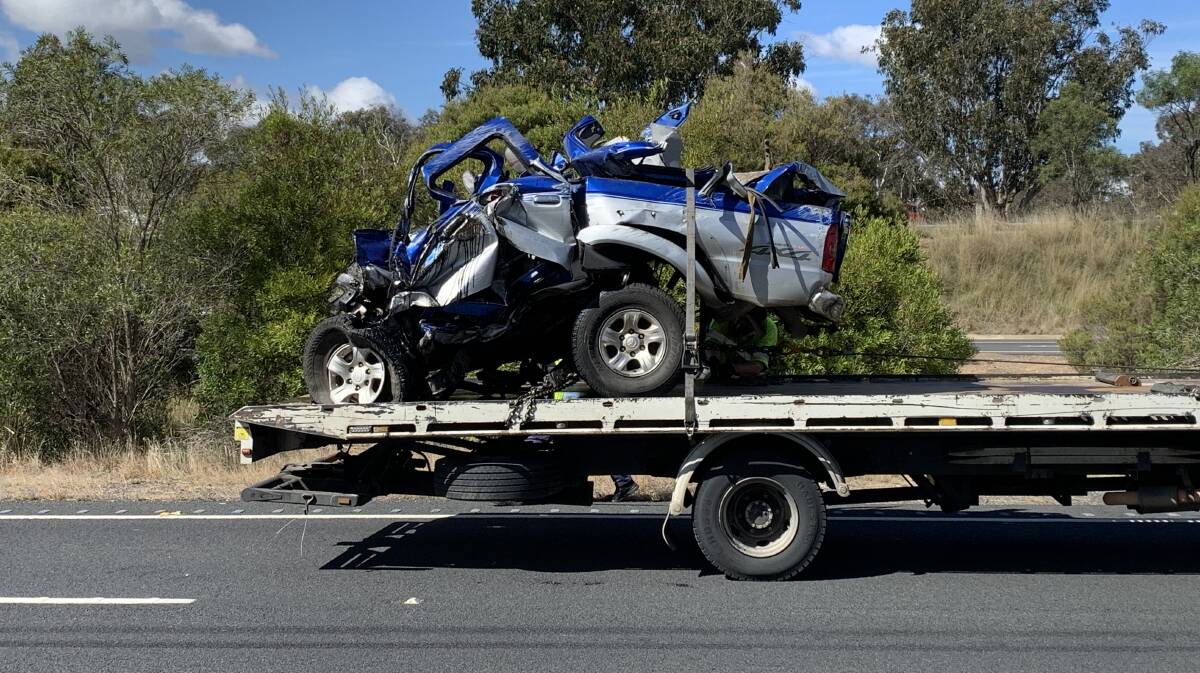 The wreckage of the twin-cab ute which had been on the wrong side of the Federal Highway when it hit a semi-trailer head-on just one month ago. Picture by Peter Brewer