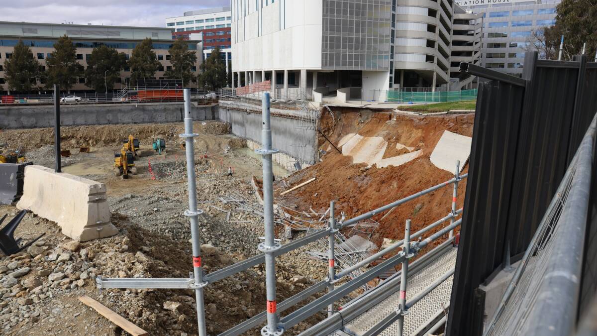The collapse of the retaining wall took out the exit road for the multi-storey car park next door to the building site. Picture: James Croucher