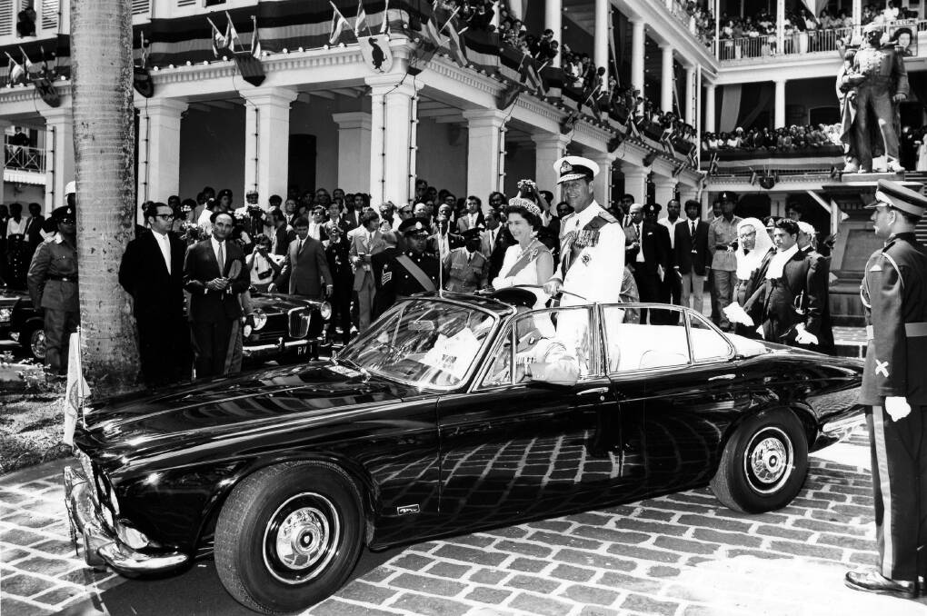 The Queen and Prince Philip in an ope-topped jaguar during their tour of Mauritius in 1972. Picturen supplied 