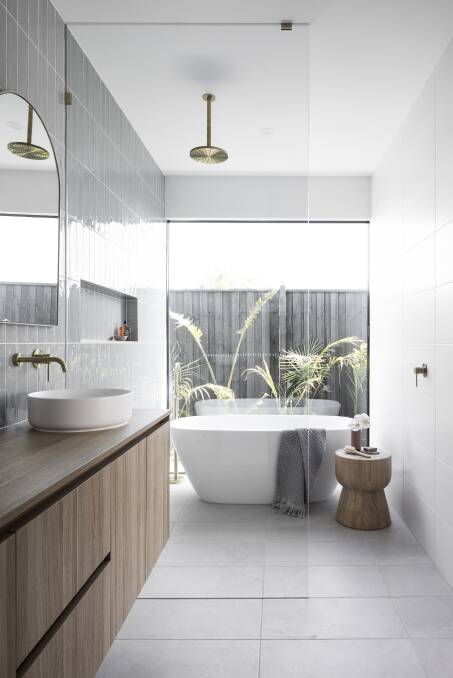 Lavish features can make bathrooms look larger and bring value to what you already have, whether that's done by replacing tapware, or adding a new bath or vanity. Picture from Beaumont Tiles 
