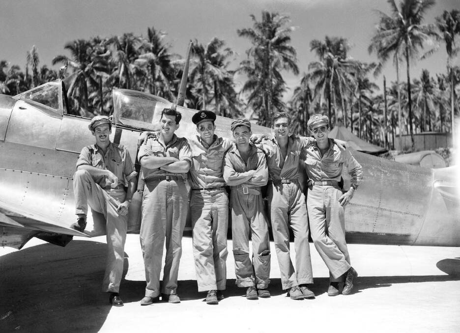 Pilots of No. 79 (Spitfire) Squadron RAAF and of the 475th (Fighter) Group 5th US Army Air Force during a visit by the latter to Momote airfield. Photo: Supplied