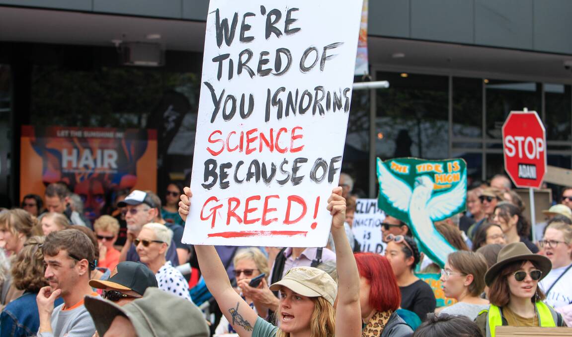People take part in the climate action rally in Wollongong in 2019. Picture: Adam McLean