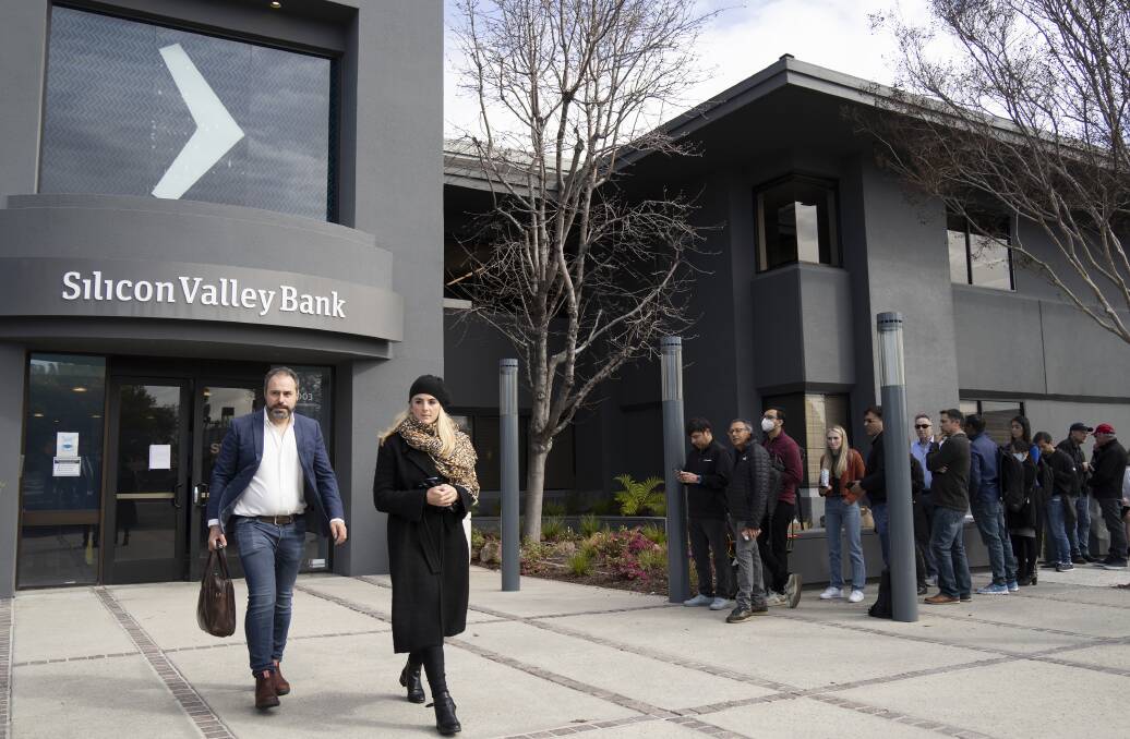 People queue up outside the headquarters of Silicon Valley Bank to withdraw their funds. Picture Getty Images