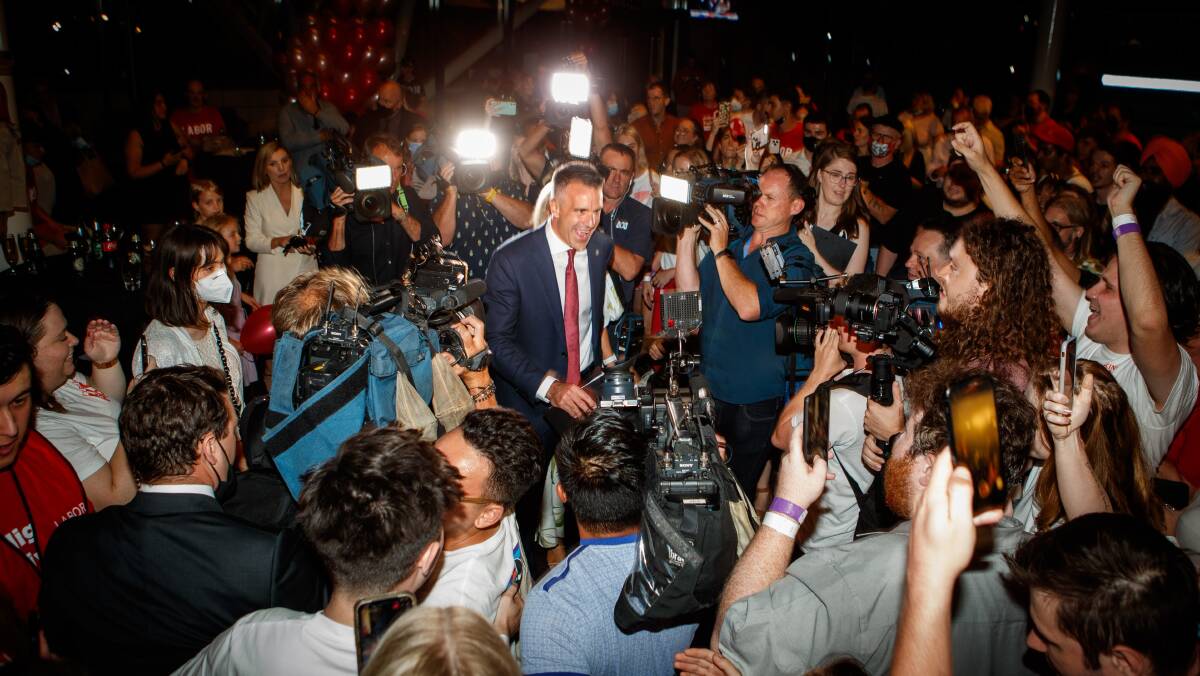 Premier-elect Peter Malinauskas and wife Annabel are swamped by supporters and media during the 2022 State Election Labor Party in Adelaide. Picture: AAP 