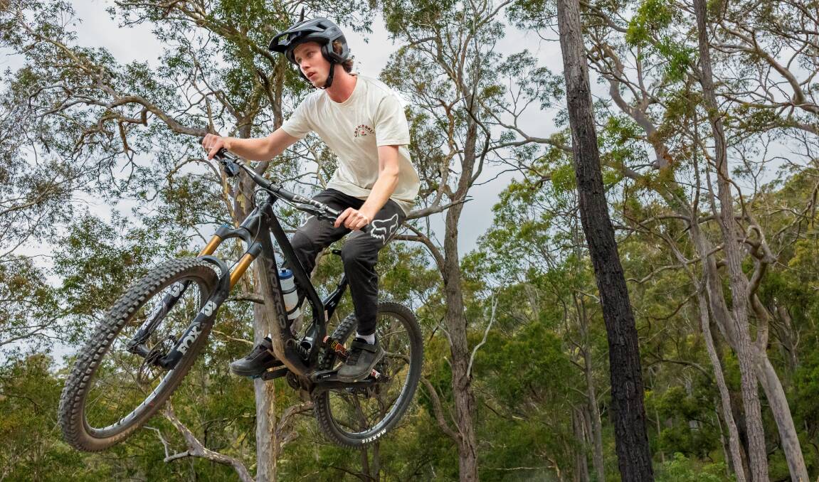 Zayd Cooper riding around the yet-to-completed Narooma Mountain Bike Park. Picture by Sitthixay Ditthavong