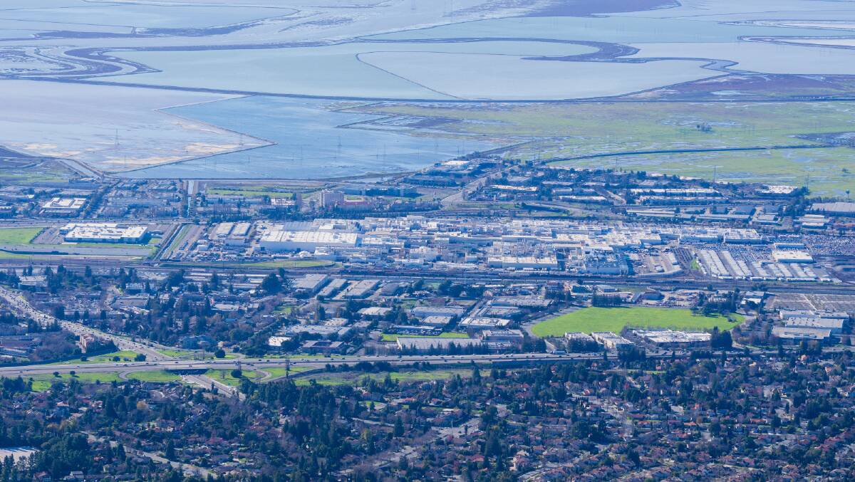 Fremont California, with Tesla's main factory across the middle of shot. Picture by Shutterstock