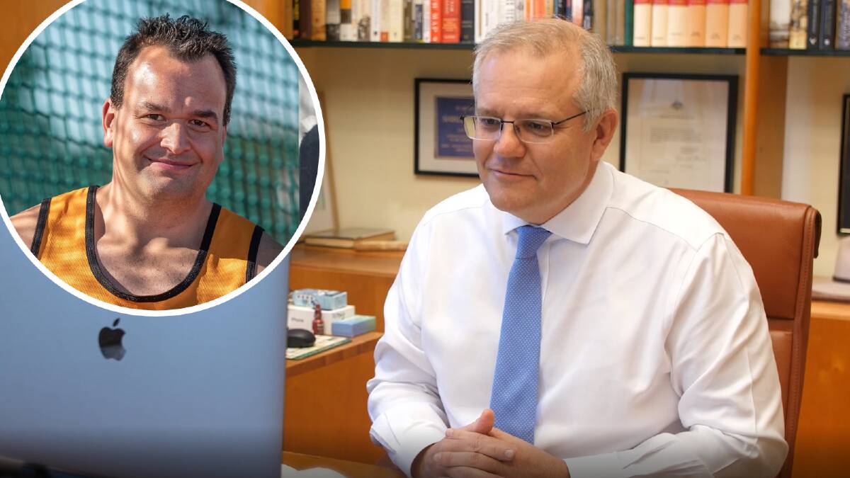 Prime Minister Scott Morrison speaking with Paralympic shot putter Todd Hodgetts.