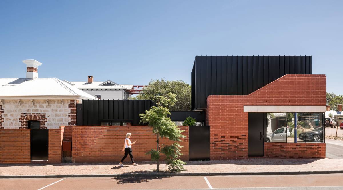 King George: Red face brickwork picks up on existing tuckpointing, and the concrete lintels are a modern interpretation of the cottages lintels. Images: Dion Robeson