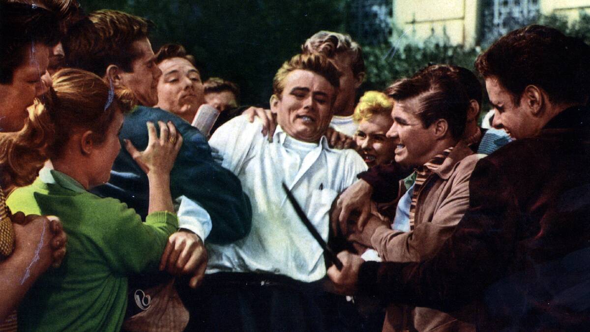 James Dean,centre, in a still from the film Rebel Without a Cause. Picture: Supplied