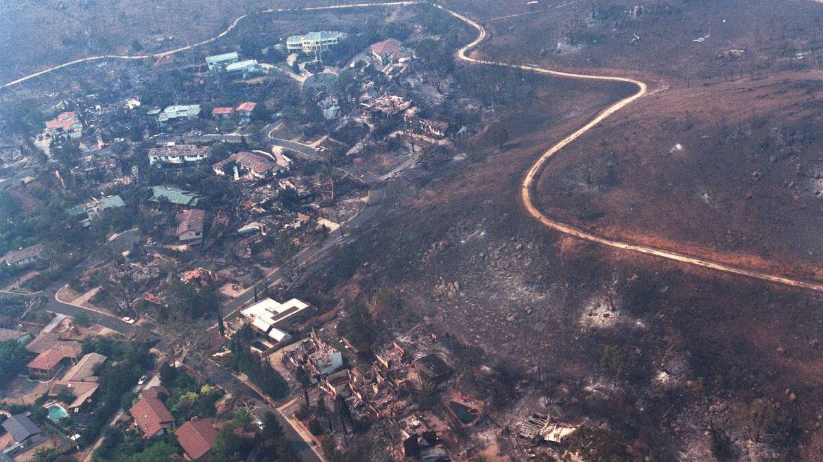 The day after Canberra's catastrophic bushfire - January 18, 2003. Picture: Jacky Ghossein