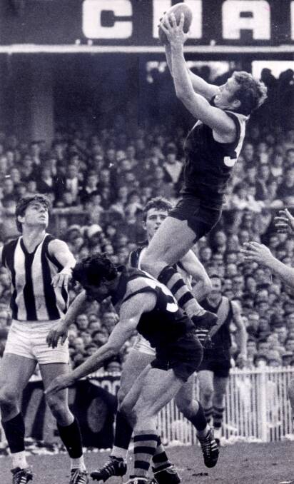 Richmond great Michael Green soaring in the 1969 preliminary final.