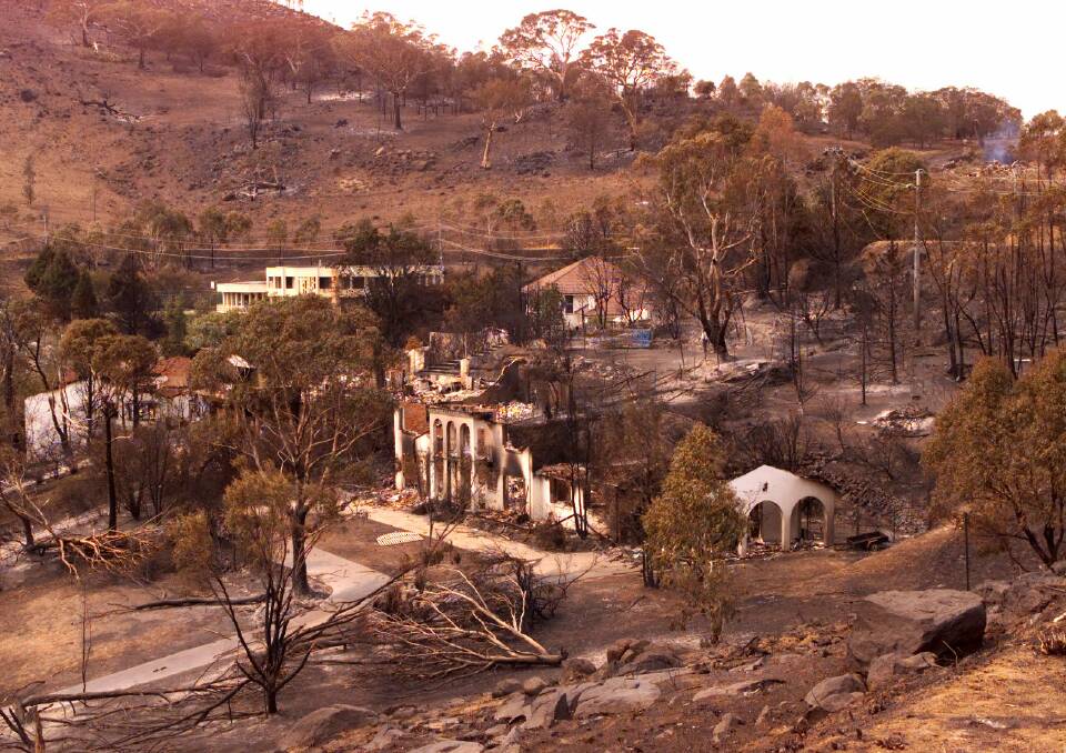 Lincoln Crescent in Chapman after the Canberra bushfires in 2003. Picture: Penny Bradfield