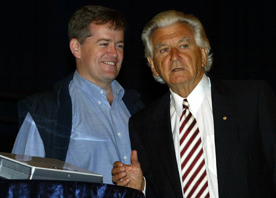 Former prime minister Bob Hawke and Bill Shorten at a trades hall rally in 2005. Picture: James Davies. 
