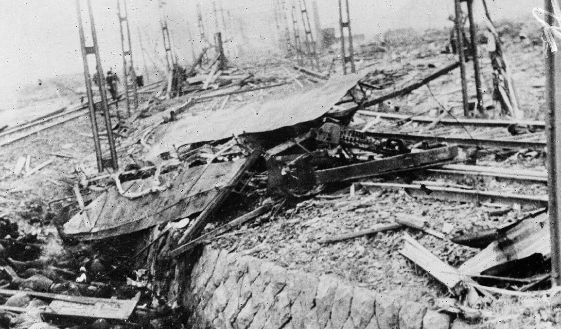 A tram, centre, flattened on its rails by the August 9, 1945 atomic bomb attack on Nagasaki. Picture: US Army Signal Corps