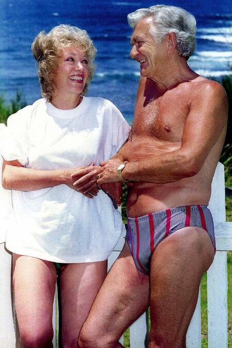 Casual: The memorable photo of couple Blanche d'Alpuget and Bob Hawke taken by Mercury photographer Orlando Chiodo on the South Coast on New Year's Eve in 1994. Picture: Orlando Chiodo
