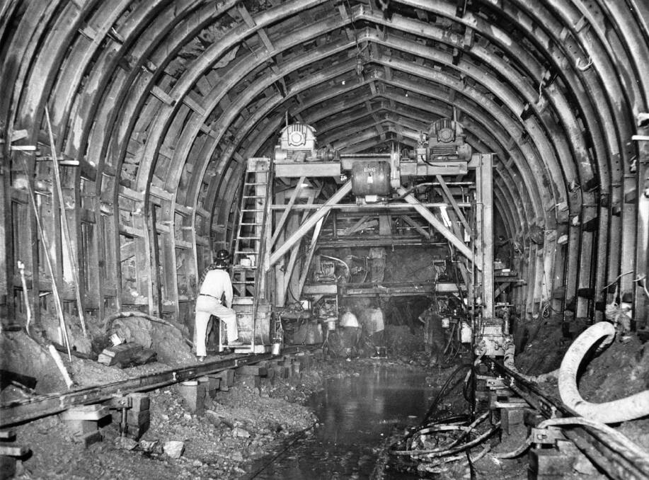 A 7-metre drilling jumbo in the 22-kilometre Eucumbene to Tumut tunnel, pictured on December 27, 1952. Picture: The Age archives
