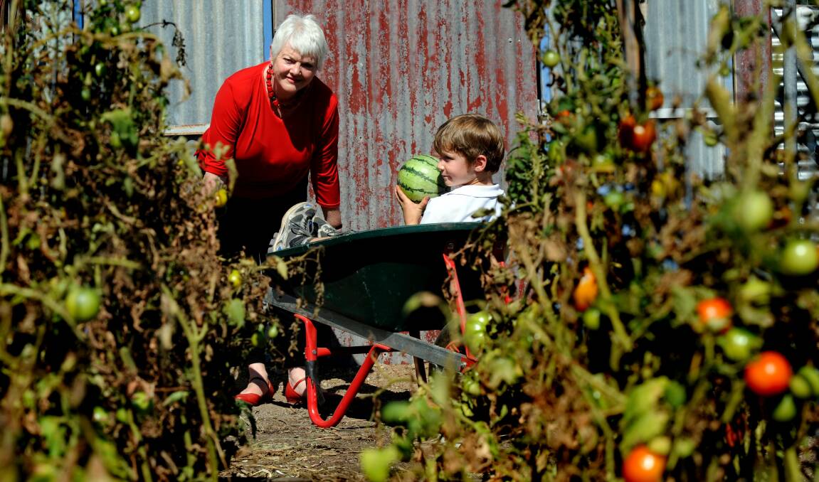 Ben Forman and Stephanie Alexander at the launch of the Kitchen Garden program at Majura Primary School in 2009. Picture: Melissa Adams