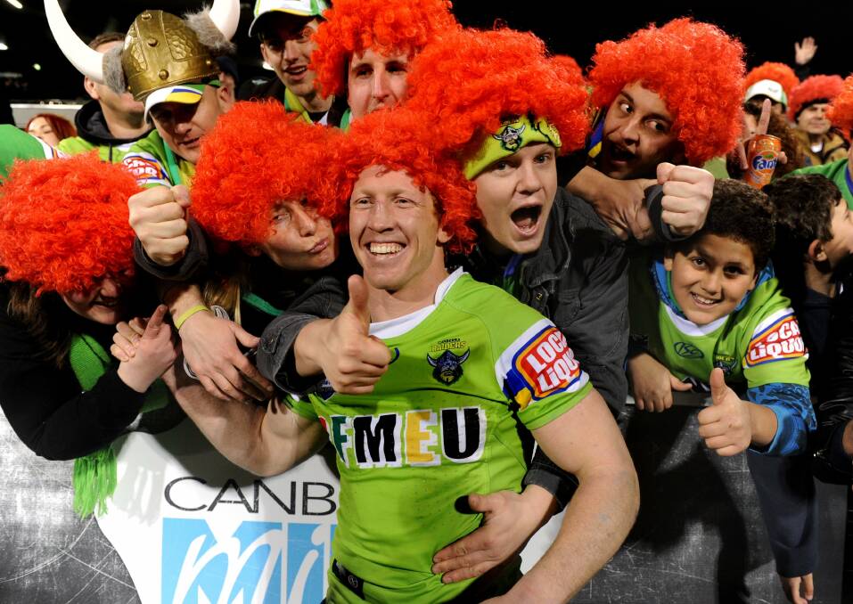 Tongue of love: Alan Tongue, centre, was a Canberra Raiders favourite throughout his 11-year career. Picture: Marina Neil