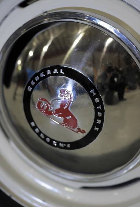 An original Holden hubcap, proudly showing the corporate lion logo. Picture: Graham Tidy.
