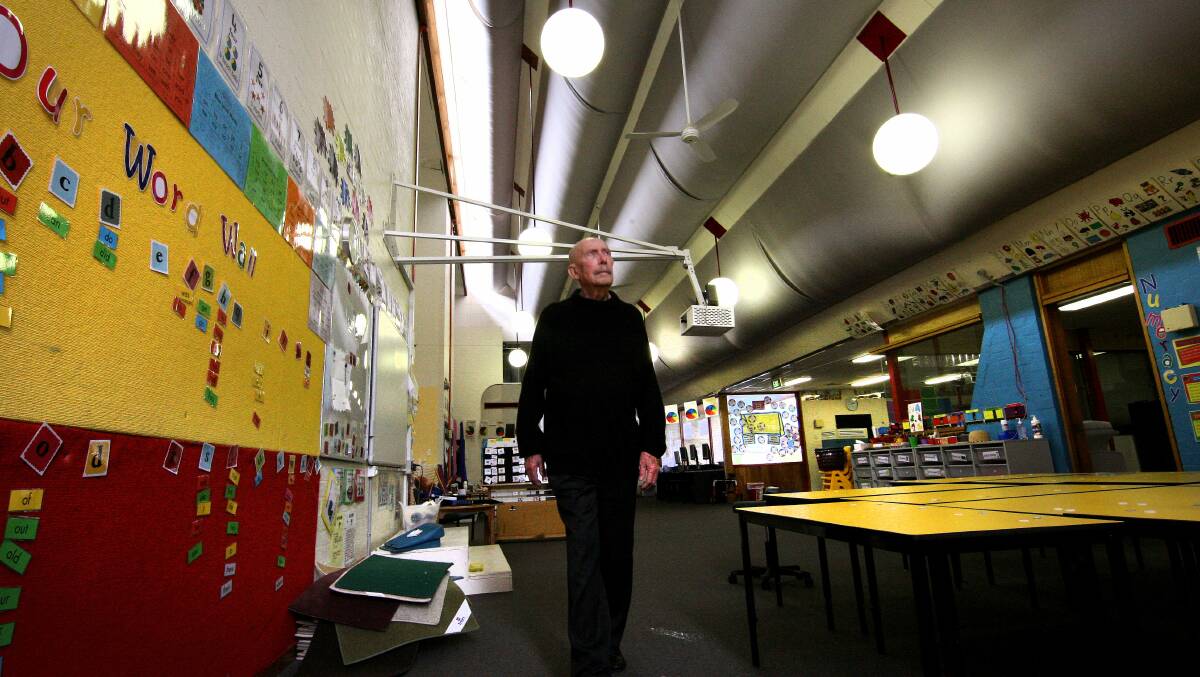 Enrico Taglietti in 2012, amid the cathedral-like ceilings of Giralang Primary School. Picture: Jeffrey Chan