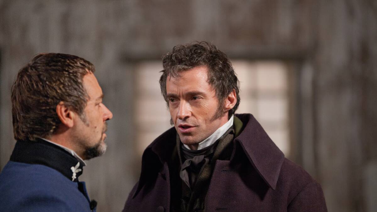Russell Crowe, left, and Hugh Jackman in Les Miserables. Picture: Laurie Sparham/ Universal Pictures