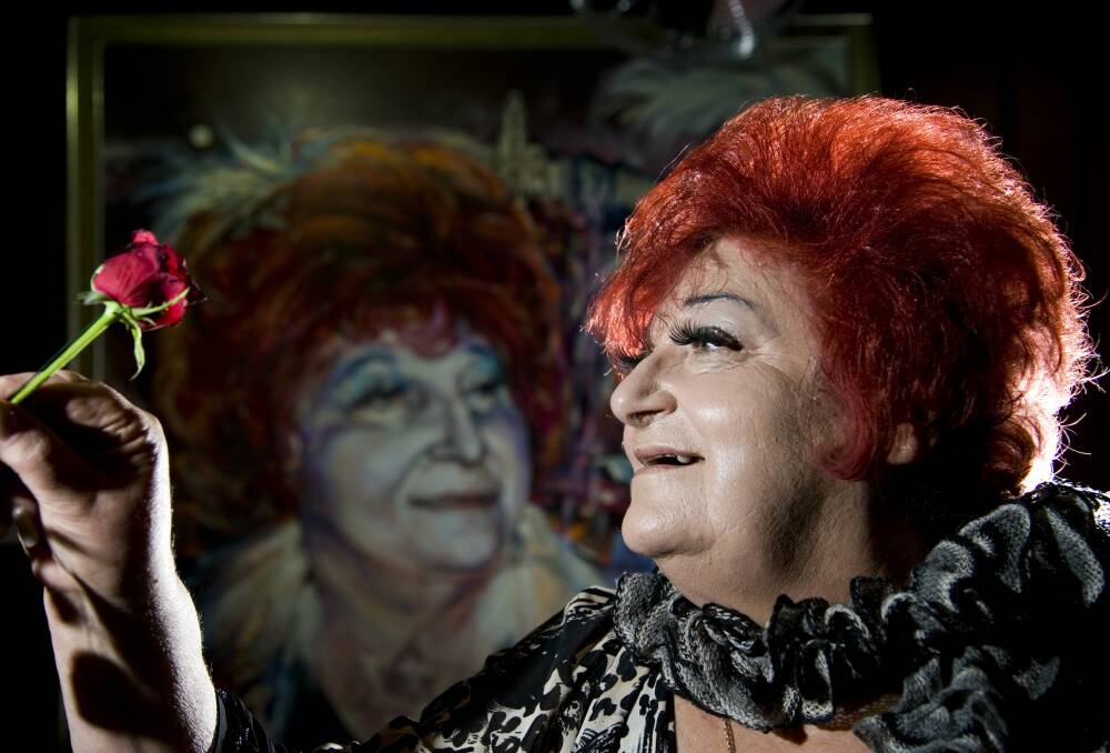  Coralie Wood with the Archibald Prize entry by Ian Henderson. Picture: Elesa Lee