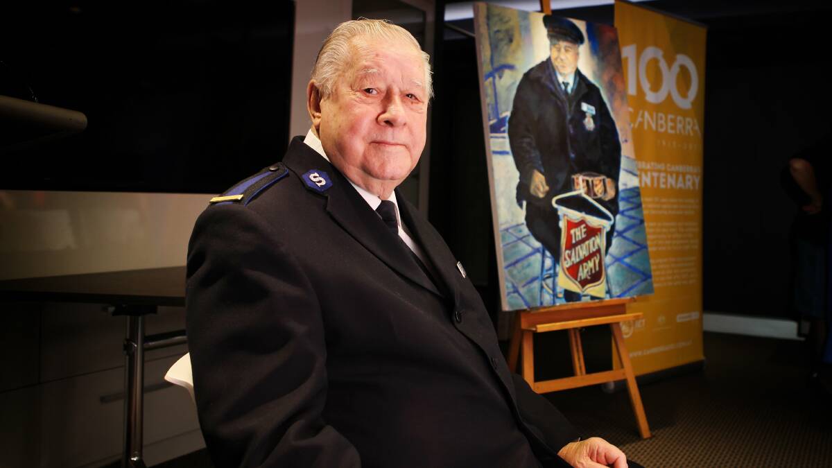 Alan Jessop sits in front of a portrait of himself painted by artist Barbara Van Der Linden as part of her centenary project 'Faces of Canberra' in 2013. Picture: Katherine Griffiths.
