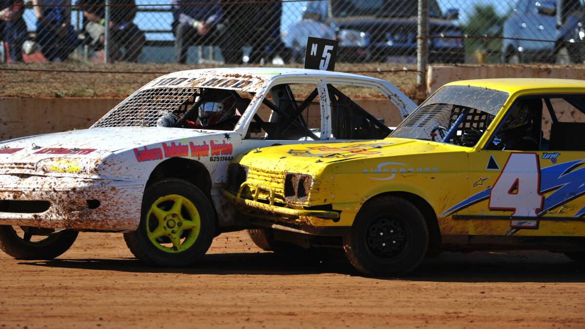 Flashback to 2013, and the fierce on-track action at the ACT speedway titles at Fairbairn Park. File picture: Graham Tidy.